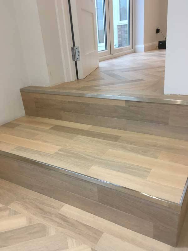 laminate flooring fitted by paul rogers flooring on floor and steps in customer's home